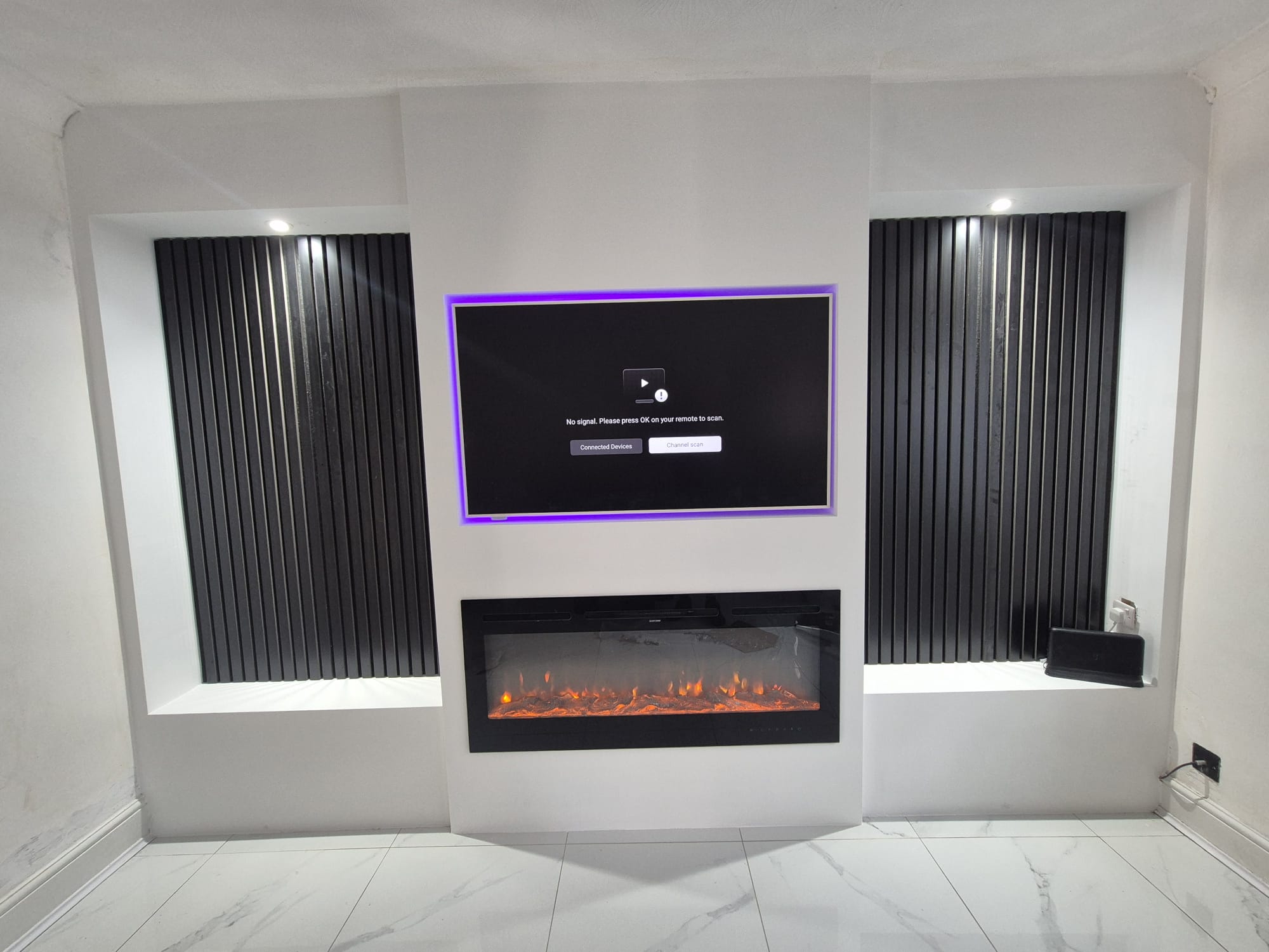 Firelight custom media wall installation